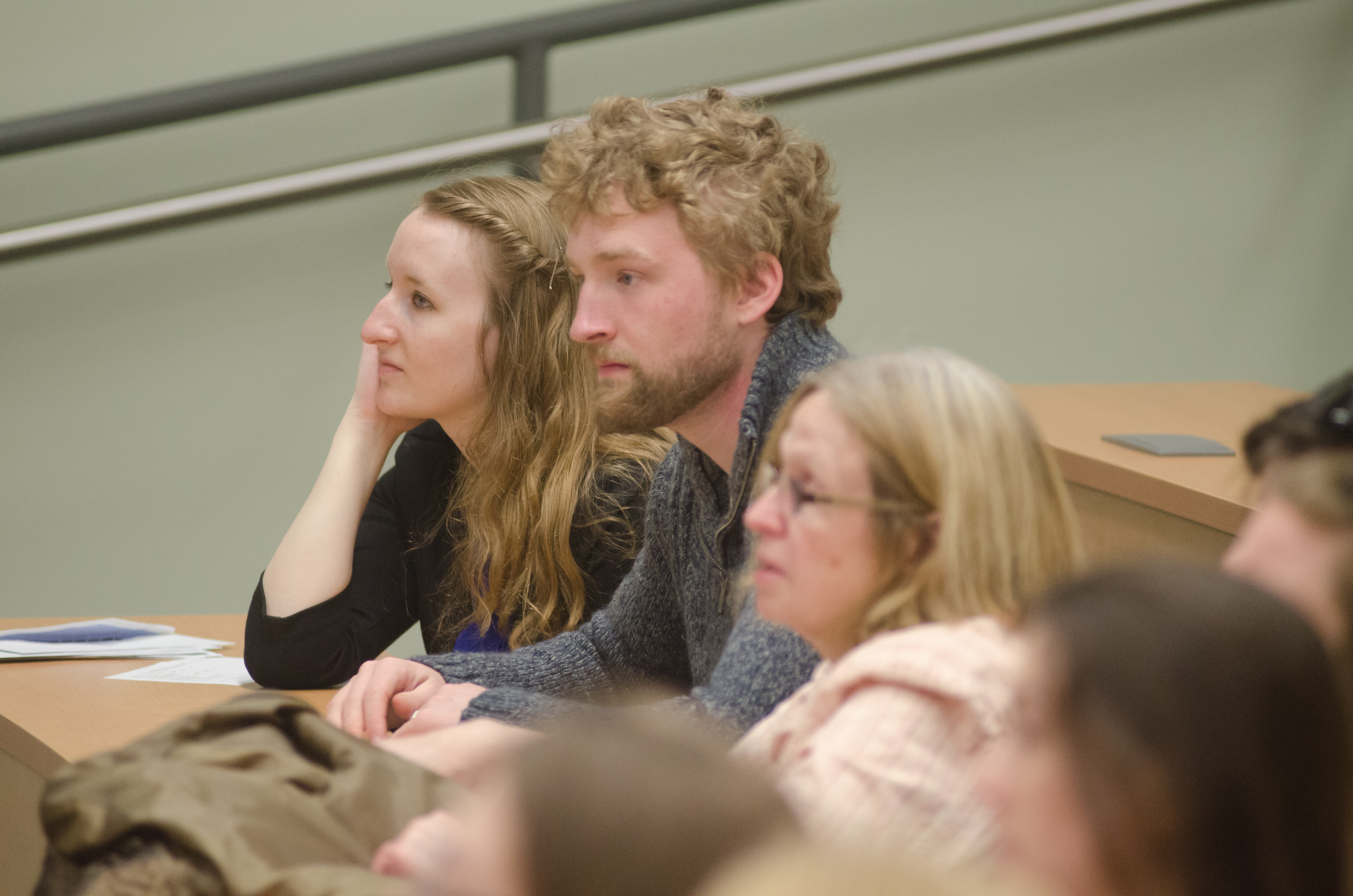 Students listen to a speaker at the Research Symposium
